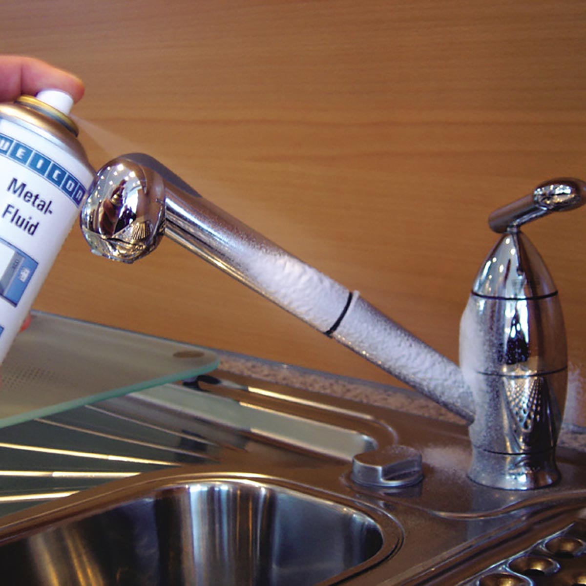 Weicon Metal Fluid Spray used to protect a stainless steel tap