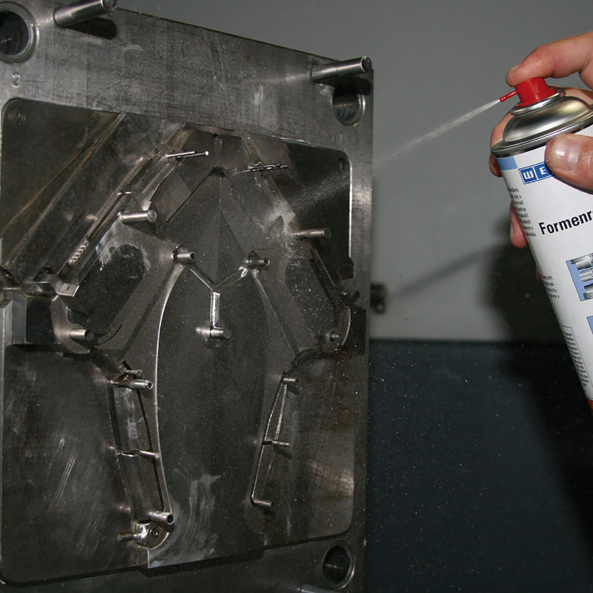 Weicon Mould Cleaner Spray Used to Clean a Metal Mould